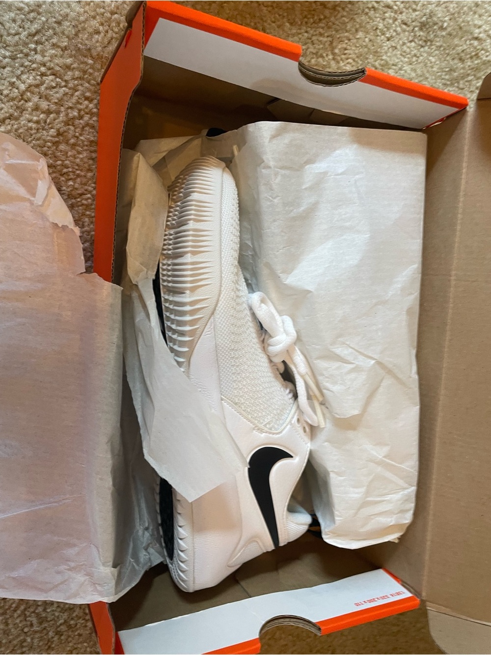 Nike Women’s White Athletic Shoes with Black Swoosh